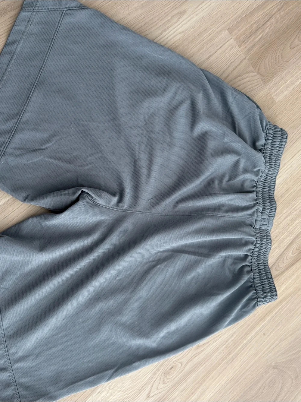 Nike Light Gray Performance Shorts with Black Swoosh